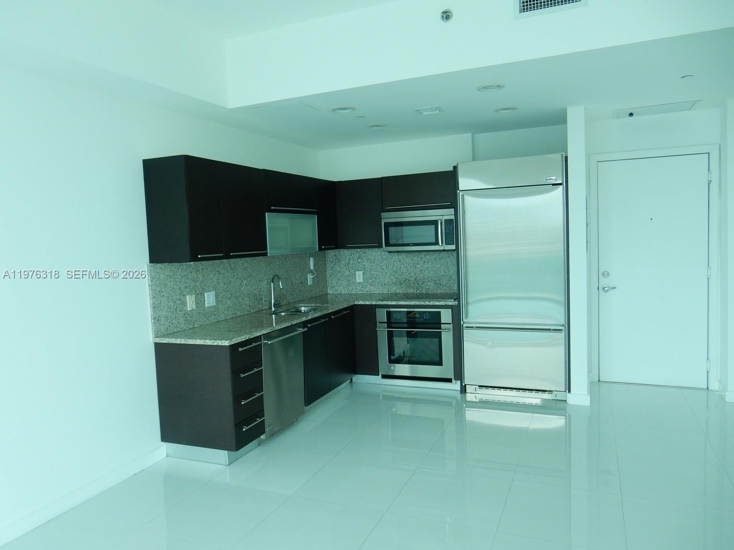 THE PLAZA 851 BRICKELL CO - Residential Lease