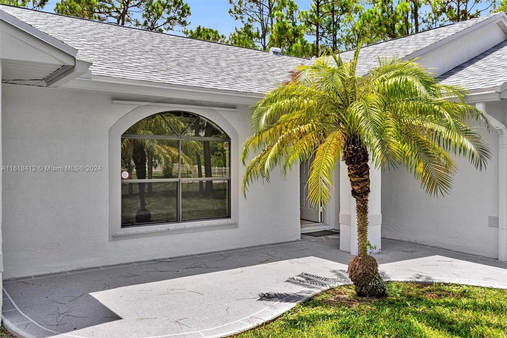 Photo of 12586 N 79th Ct N, West Palm Beach, FL 33412 (MLS # A11618412)