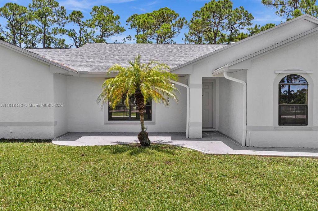 Photo of 12586 N 79th Ct N, West Palm Beach, FL 33412 (MLS # A11618412)