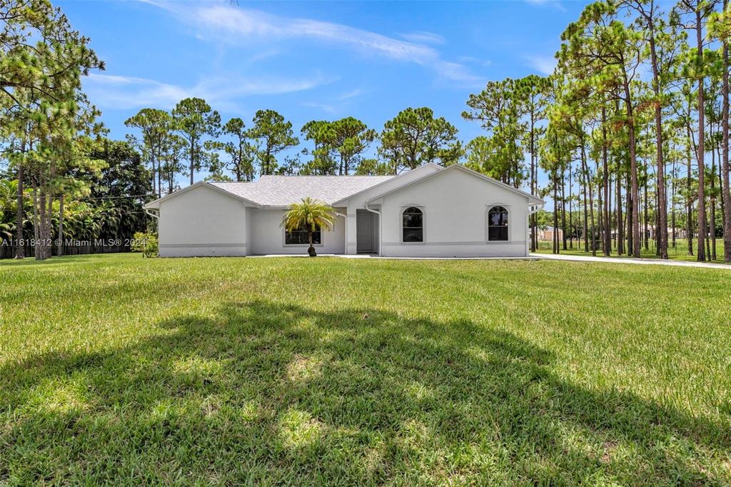 Photo of 12586 N 79th Ct N, West Palm Beach, FL 33412 (MLS # A11618412)