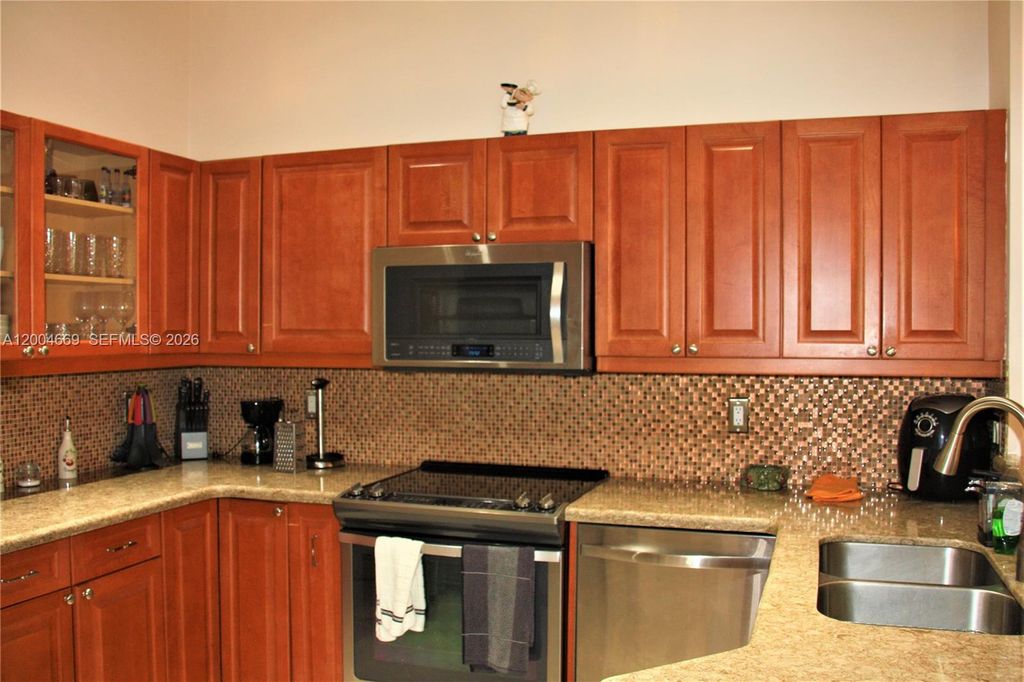 Photo of 4291 Magnolia Ridge Dr, Weston, FL 33331 (MLS # A12004669)