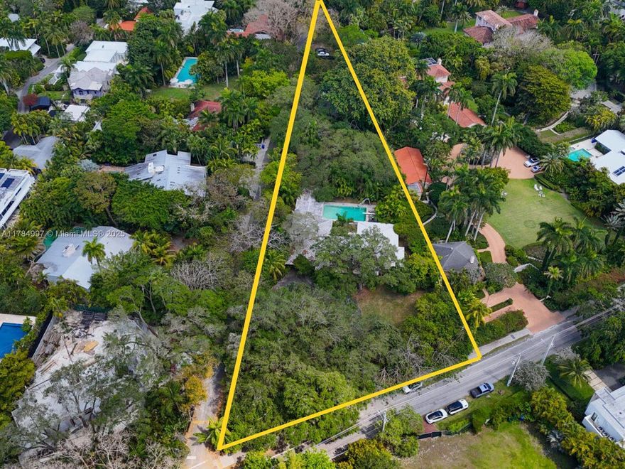 An extraordinary opportunity in prestigious South Coconut Grove—on the market for the first time since 1953. Spanning an impressive 74,052 SF, this is the largest residential parcel currently available in Coconut Grove, offering a rare canvas for a one-of-a-kind custom compound. Nestled on one of South Grove’s most desirable & exclusive streets, the property presents endless possibilities for developers, investors, or end users seeking space, privacy & timeless prestige. Ideally positioned near some of Miami’s most respected private schools, with convenient access to top educational institutions. Located near the heart of Coconut Grove—CocoWalk, marinas, lush parks & acclaimed restaurants.A once-in-a-generation chance to own a legacy property in one of Miami’s most treasured neighborhoods.