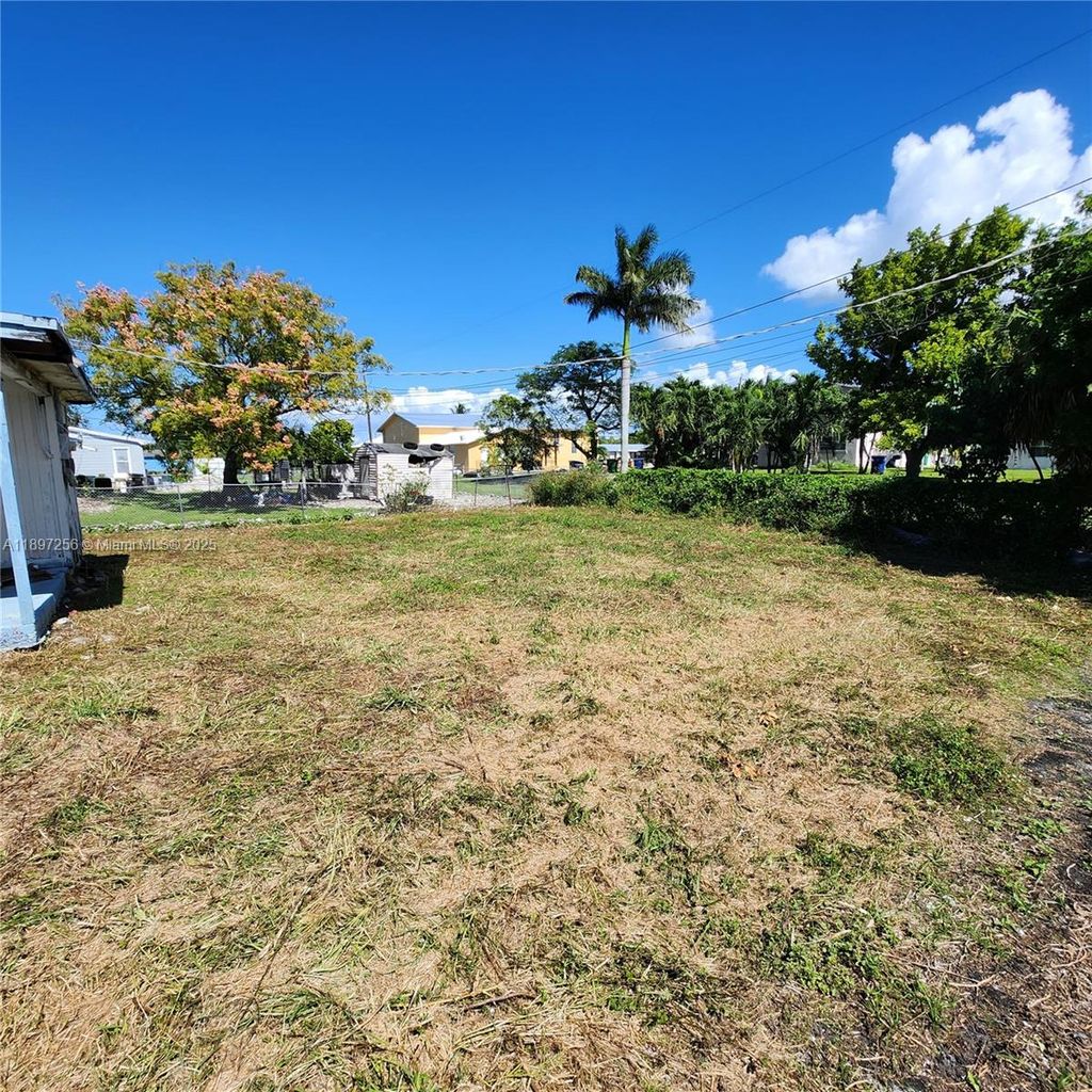 Photo of 245 SW 11th Ave, South Bay, FL 33493 (MLS # A11897256)