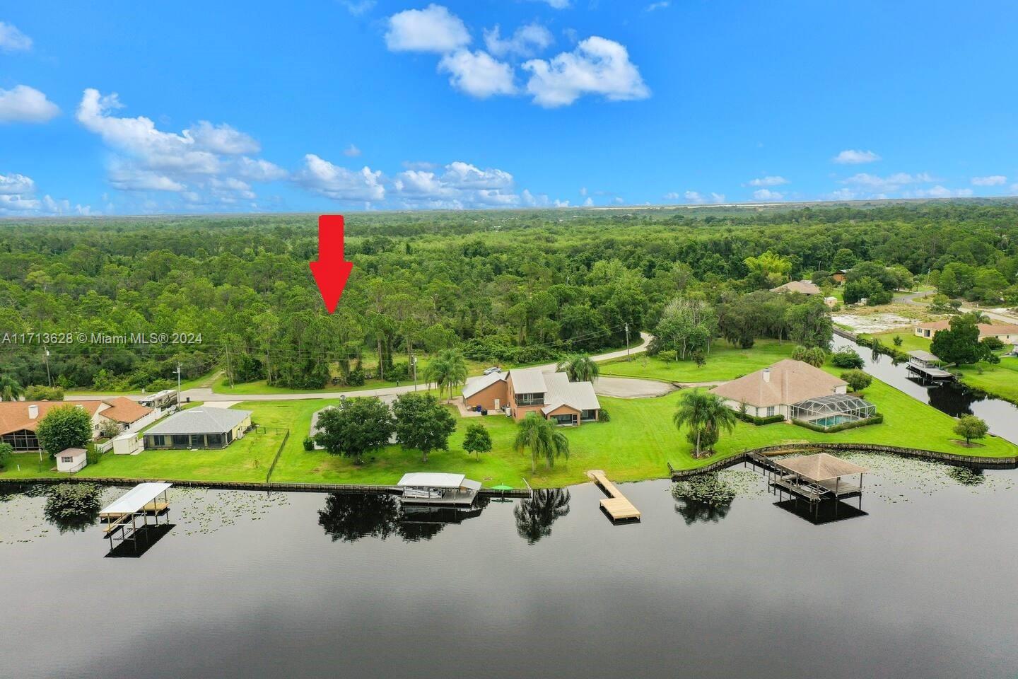2 lots for the price of 1. Seller financing available. This double lot (20,908 sq.ft/0.48 ac) is located in a peaceful, beautiful & wooded area on a dirt road, across from lake Carrie in Lake Placid, a town in Highlands County, Florida, known as the "Caladium Capital of the World" & the "Town of Murals," featuring 47 murals throughout the area. This small town is recognized for its caladium farms & many lakes; the center of this village is very active, with beautiful luxurious stores & a fresh market every Saturday morning. Lake Carrie is surrounded by million dollar homes & a forest where you may see deer & exotic birds. A golf cart or quad will take to the pathways inside the wilderness. World famous Sebring racetrack is 18 miles away. Bring your jet ski & boat to the ramp of the lake!