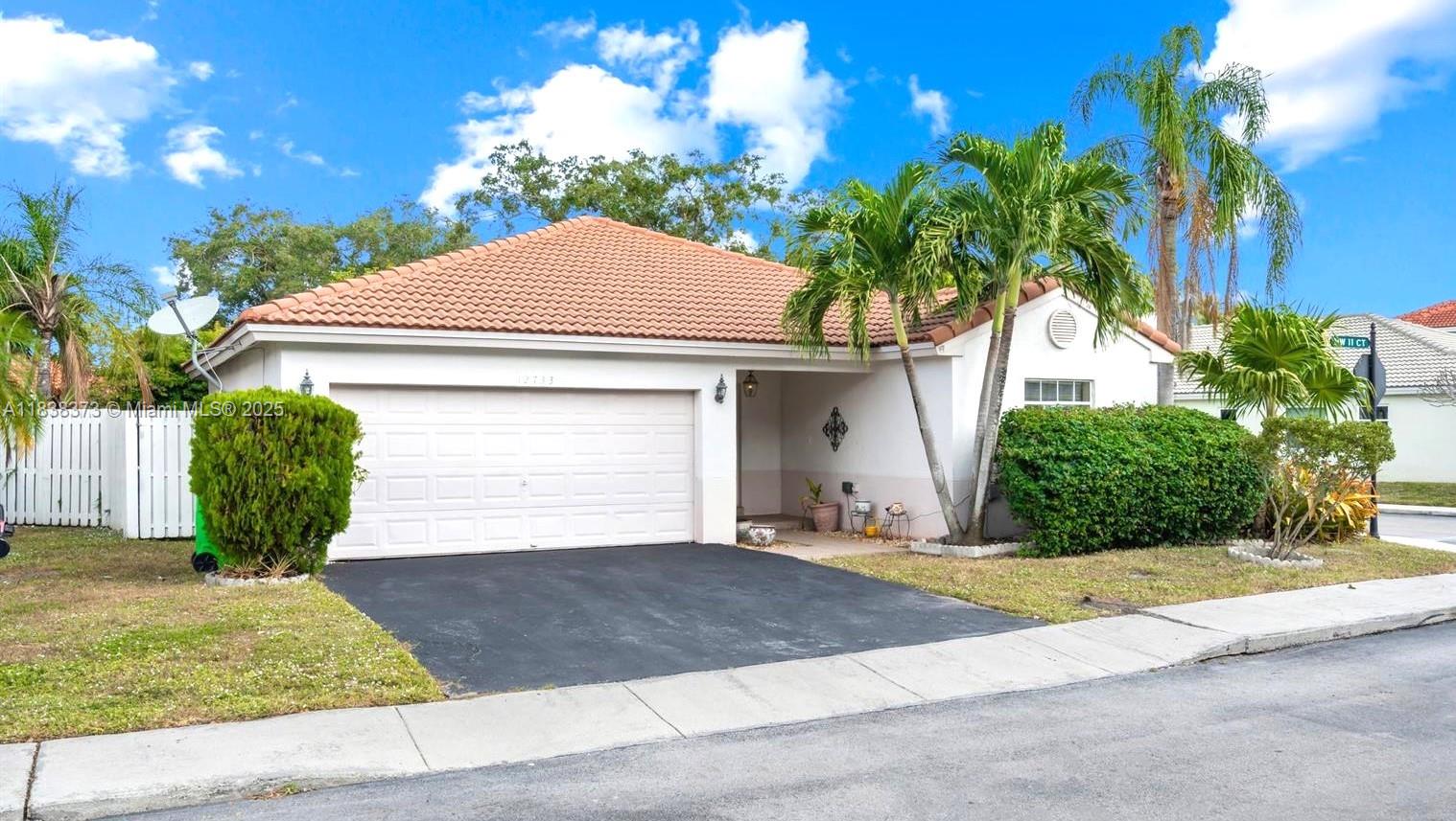 Spacious corner lot 3/2 plus den, 4th bedroom or office (partially converted garage can easily be reconverted) single-family home home features updated kitchen with stainless appliances and granite counters with open floor plan with a split bedroom plan. Approximate age of A/C unit 2022, Roof 2007. Incredible location just minutes from the Sawgrass Mills Mall and the Entrance to Major Highways and A-Rated Sawgrass Elementary School. Low HOA includes maintaining exterior lawn. Close to Flamingo Park offering great amenities like Bike Station, Soccer, Softball, Splash Pad, playground, T-ball, Tennis, Walking and running Path, outdoor gym. *** property needs some tlc.**motivated seller**Bring your offers**
