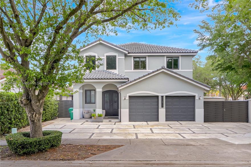 This beautifully updated 4-bedroom, 2.5-bathroom home features modern upgrades, including new ceilings, impact windows, and top-of-the-line appliances (2022). The open-concept living/dining area flows seamlessly into the backyard oasis with a pool and pergola. The primary suite offers ample closet space and a renovated bath. A converted double garage provides extra living space or income potential. Located near top-rated schools, restaurants, and shopping. The spacious corner lot provides ample outdoor space for entertaining and relaxation, with a BBQ area perfect for hosting family and friends. Enjoy the convenience of nearby parks, major highways, and easy access to everything Miami has to offer. Don't miss the chance to make it yours!