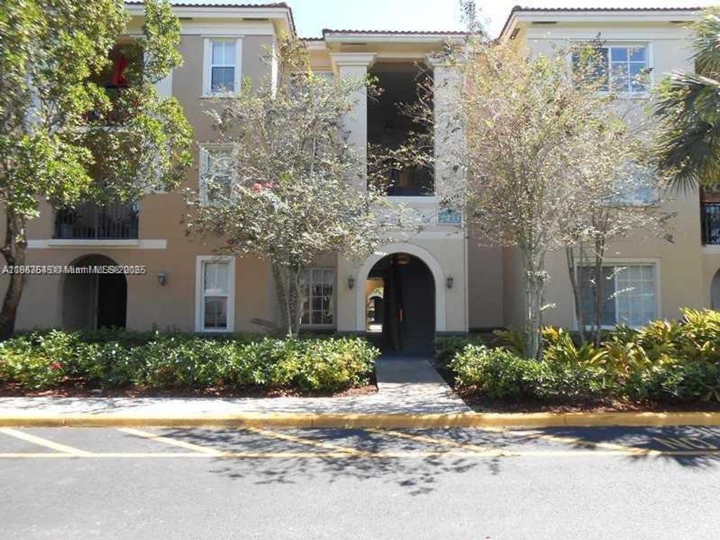 Photo of 2433 Centergate Dr #204, Miramar, FL 33025 (MLS # A11853545)