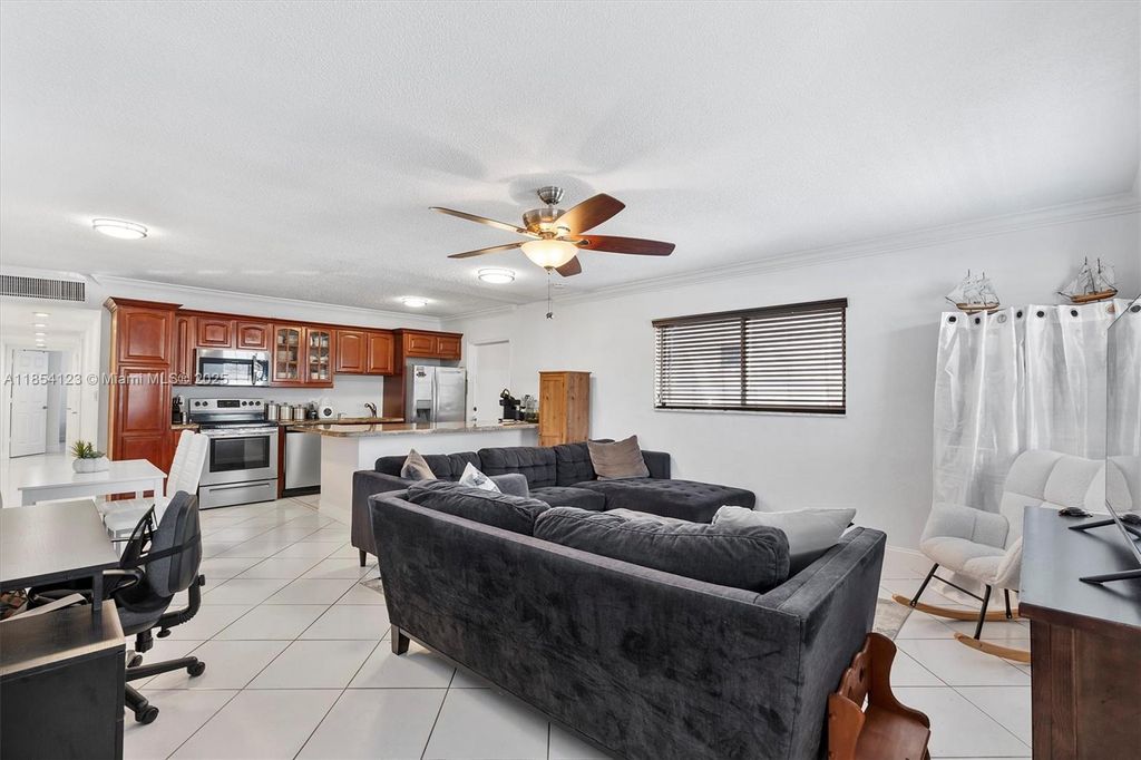 Photo of 2701 Middle River Dr #10, Fort Lauderdale, FL 33306 (MLS # A11854123)