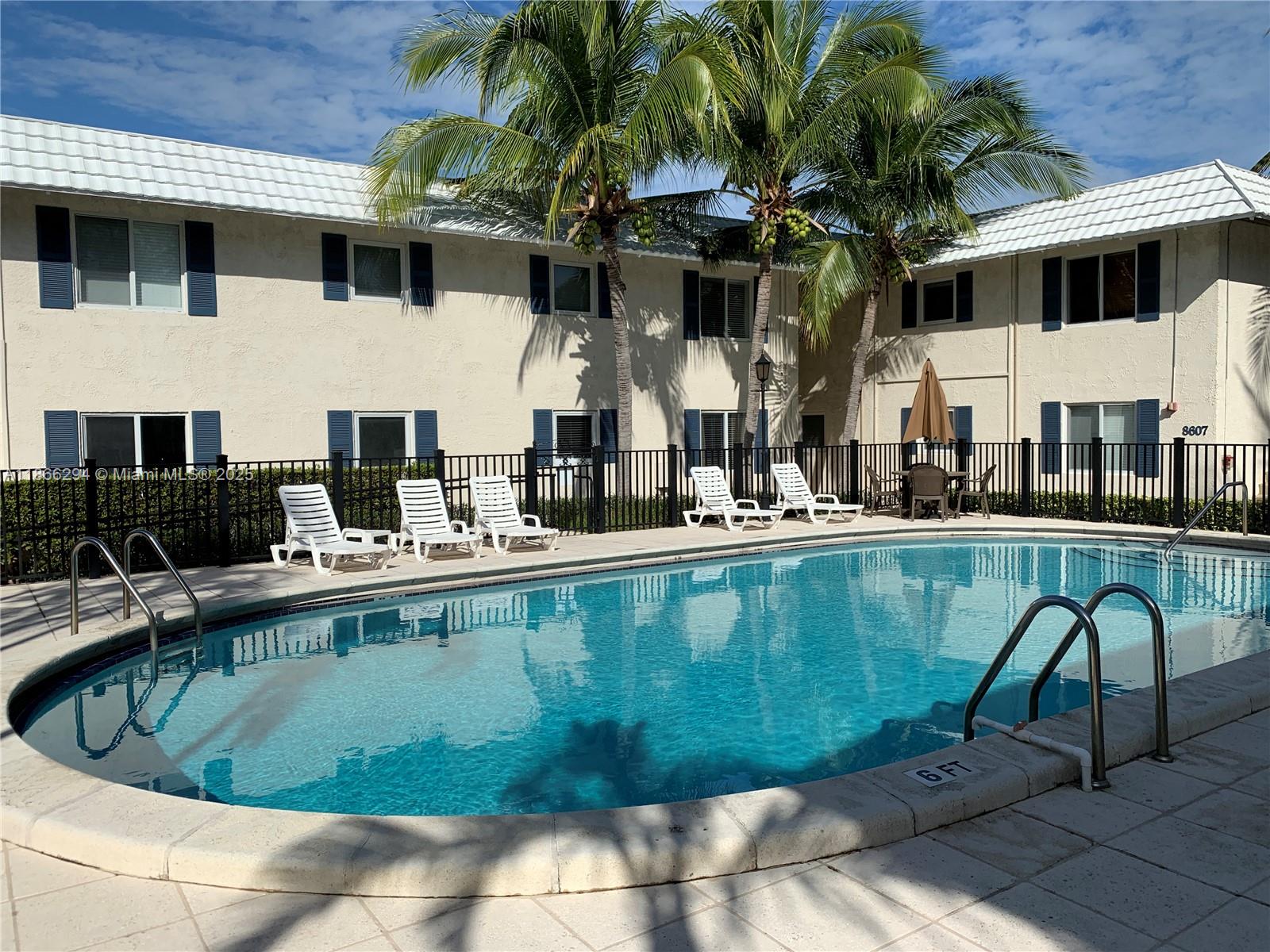 Monterrey Gardens of Pinecrest – Gated community across from US-1. FOR RENT: First-floor apartment (no stairs) with 1 bedroom, 1 bath, and 578 SF of living space. This charming corner unit features an open, light-filled layout, impact-resistant windows, vinyl flooring, and an upgraded kitchen equipped with a microwave, refrigerator, electric range & oven. One (1) Assigned parking is conveniently located at your doorstep. Community amenities include a secured gated entry with cameras, a pool, upgraded laundry facilities, landscaped garden areas, sidewalks, and guest parking. Prime location within walking distance to Dadeland Mall, Downtown Dadeland, hospitals, university, supermarkets, restaurants, bars, shopping malls, MetroRail stations, and more.