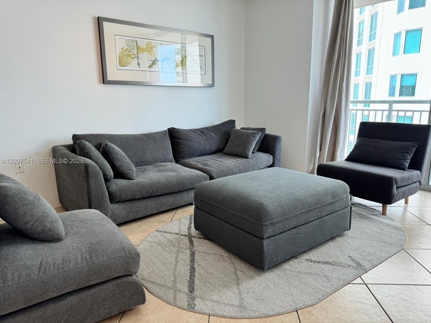 Experience sophisticated urban living in this modern one-bedroom, one-bathroom residence in the prestigious Metropolis II building. Enjoy breathtaking city views from your private balcony and relax in the spacious bedroom featuring a generous walk-in closet. The convenience of an in-unit washer and dryer enhances daily comfort. This unit includes one assigned parking space plus valet parking for a second vehicle. Metropolis II offers resort-style amenities, including a 24-hour doorman, state-of-the-art gym, two sparkling pools, and a stylish entertainment room. Perfectly located within walking distance to Dadeland Mall and top dining destinations, with easy access to major highways and the Metrorail Station, this home blends luxury with unmatched convenience. Furniture is negotiable.