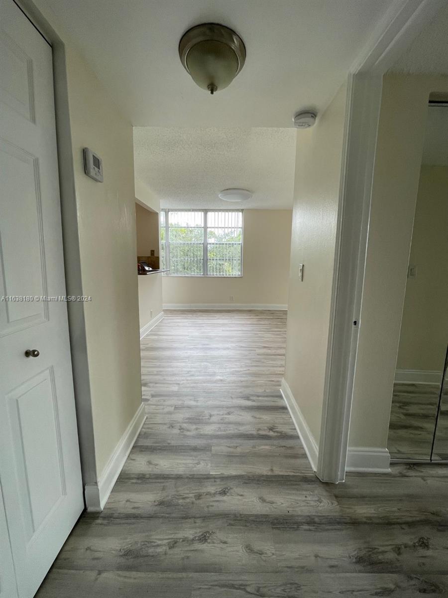 PINE ISLAND RIDGE AT EVERGREEN, THIS INVERSTOR/RESIDENT UNIT HAS ALL THE AMENITIES ONE MAY WANT. LOCATED ON A GOLF COMMNITY WITH LOCAL POOL, COMMUNITY POOL, BICYCLE AND JOGGING PATHS, PICK-NIK AREAS, TENNIS, PICKLEBALL, BASEBALL CAGE, LIBRARY, GYM, SAUNA, A FORMAL RESTAURANT AND A SPORSTS BAR, GOLF PRO SHOP, THEATER, WONDEFUL CLUB HOUSE WITH DOOR MAN AND OTHER AMENITIES, DESIGNATED PARKING PLUS PLENTY OF EXTRA PARKING, IT CAN BE RENTED ONLY AFTER 2 YEARS OF OWNERSHIP, THIS CORNER UNIT IS VERY BRIGHT AND LOCATED AT TOP FLOOR, TILE AND WOOD (MODERN PVC DURABLE) THROW-OUT, SEE BROKER REMARKS FOR MORE DETAILS ON ACTUAL TENANCY.