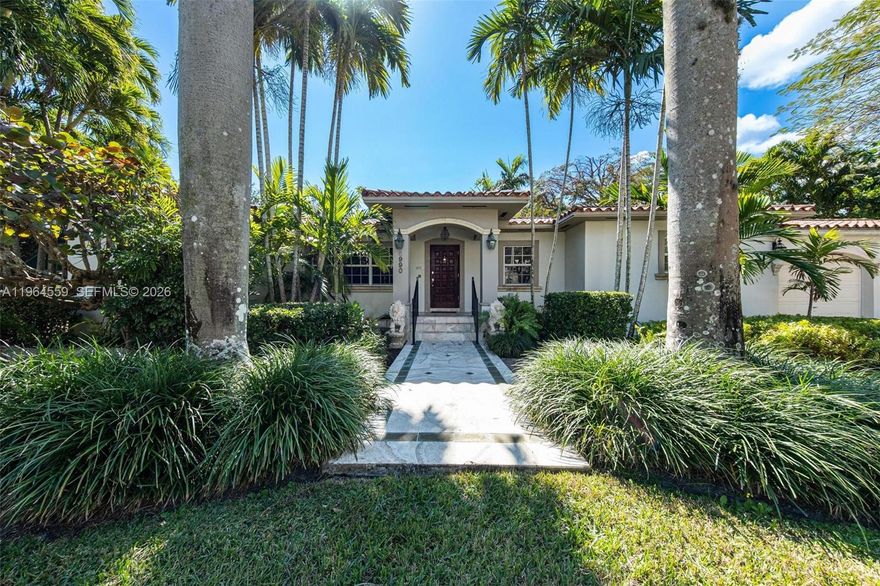 Timeless Mediterranean Charm in South Miami; A Rare Opportunity on a Sprawling Corner Lot. Nestled in the heart of South Miami, this stunning Mediterranean-style residence offers a perfect blend of historic soul and modern meticulousness. Situated on an expansive corner lot of over 1/3 acre, the property provides a sense of space and privacy that is increasingly rare in today's market. A Legacy of Care: This isn't just a house; it’s a home that has been cherished by the same family since the 1970s. Their pride of ownership is evident in every corner, from the pristine maintenance of the original architectural details to the thoughtful, high-end updates integrated over the decades. Key Features & Interior Highlights: Voluminous Great Room: The heart of the home is a dramatic, two-story Great Room. With soaring ceilings and an abundance of natural light, it serves as a grand centerpiece for both daily living and formal gatherings. Seamless Aesthetic: Elegant tiling runs throughout the entire residence, offering a clean, cool, and low-maintenance flooring solution perfectly suited for the Florida climate. Indoor-Outdoor Flow: Classic French doors transition the interior space to the outdoors, inviting the garden views inside.