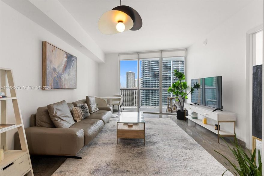 Well-appointed 1-bedroom, 1-bathroom residence on the 26th floor offering sweeping views of the Miami skyline, Downtown, and the Miami River. The thoughtfully designed layout is both efficient and comfortable, complemented by an open balcony ideal for enjoying the cityscape. Tastefully furnished and move-in ready.

Located at Icon Brickell, a premier full-service luxury condominium offering resort-style living with world-class amenities including a renowned spa, newly renovated fitness center, and the largest pool deck in Florida overlooking Biscayne Bay. Residents enjoy 24-hour concierge and valet, private theater, convenience store, and two acclaimed on-site restaurants — Cipriani and Cantina La Veinte.

One assigned parking space included. Prime Brickell location just steps from Brickell City Centre, top dining, shopping, and Miami’s vibrant financial district.