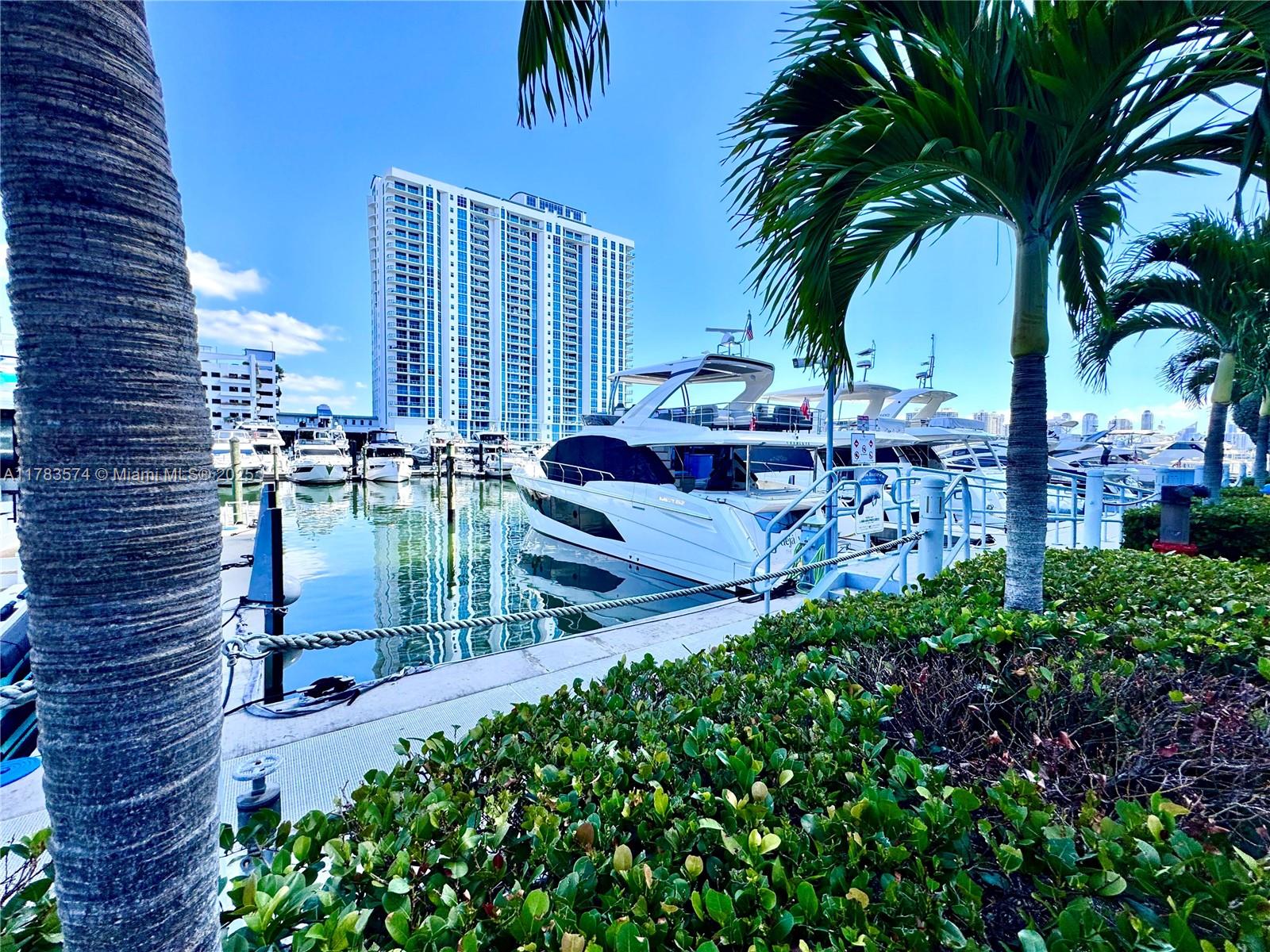 Exceptional opportunity to own a 60-foot x 24-foot boat slip in the prestigious Marina Palms Yacht Club, located in the heart of Aventura. This slip accommodates vessels up to 75 feet and is positioned within a world-class, full-service marina offering 20/50 Amps shore power, fresh water, WiFi, fueling, and a full-time professional dockmaster for your convenience. Unrestricted ownership—open to both residents and non-residents—makes this an ideal option for local boaters. The gated secure marina with 24/7 security offers self-parking for slip owners. Enjoy access to a private Yacht Club lounge, concierge services, and upscale waterfront facilities. With direct ocean access and no fixed bridges, this location provides effortless navigation to the Intracoastal and beyond.
