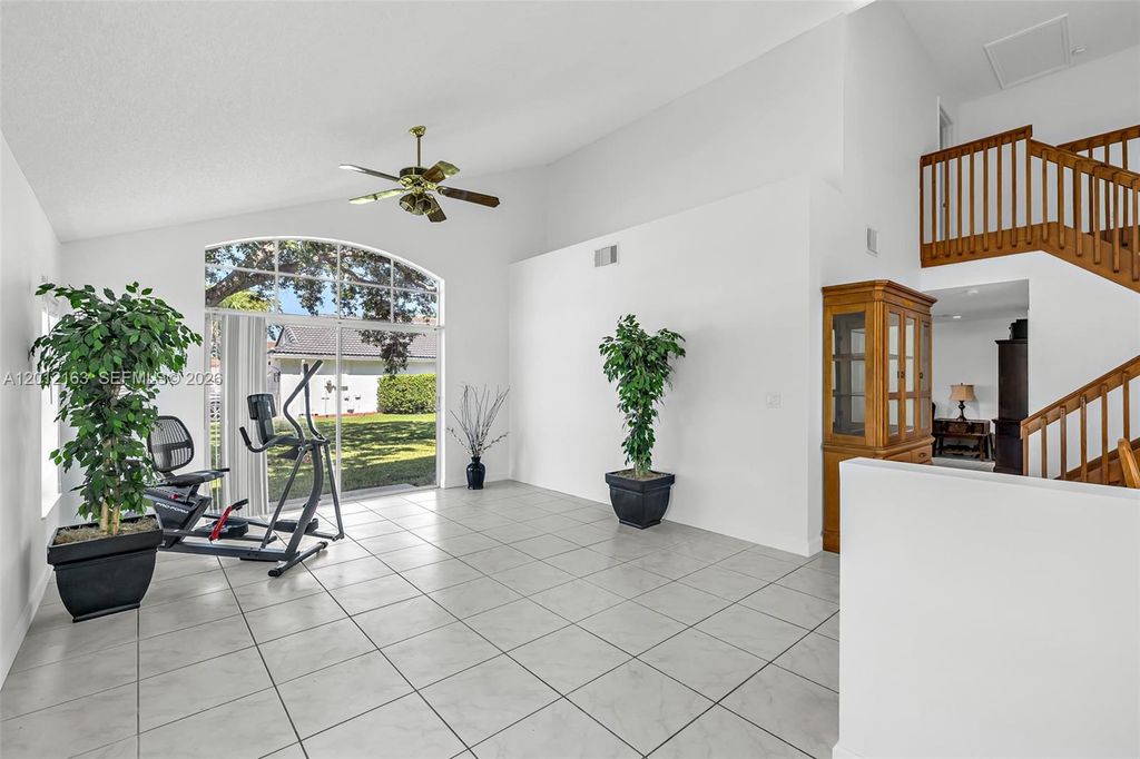 Photo of 1910 NW 180th Way, Pembroke Pines, FL 33029 (MLS # A12012163)