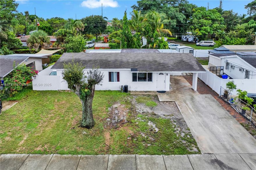 Welcome to this beautifully updated 3-bedroom, 2-bath home in a prime location with easy access to the Turnpike, I-595, and 441. Enjoy peace of mind with a brand-new A/C, updated electricity, impact windows, new kitchen, spacious terrace, new fence, and a roof installed in 2021. The inviting layout is perfect for relaxing or entertaining, while the terrace and fenced yard provide the ideal setting for outdoor gatherings. Conveniently located near shopping, dining, schools, and major universities including Nova Southeastern and Florida Atlantic. Whether you’re a first-time buyer or an investor, this property offers comfort, modern upgrades, and excellent value. Don’t miss the chance to make it yours!