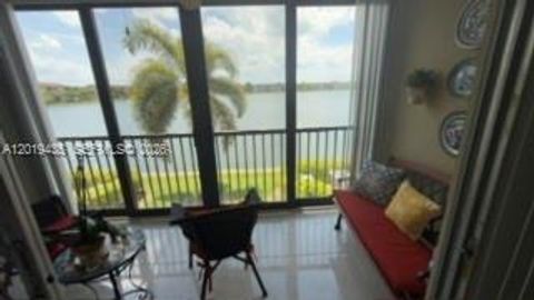 Photo of 1400 SW 131st Way #203Q, Pembroke Pines, FL 33027 (MLS # A12019435)