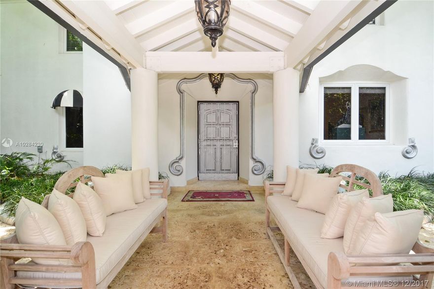 Ultra-Private. Absolute showplace on hot Flamingo Drive. In a quality class of its own. Huge corner lot. Impeccably renovated + new addition, impact windows, large pool, beautifully landscaped grounds w/mature specimen trees. White marble custom kitchen w/Viking & sub-zero appliances. Crown molding throughout. 3/2 up + 2/2.5 down. Property completely walled & gated, security system w/cameras & full house generator. Gracious, gorgeous & very, very special. **SEE BROKER REMARKS***