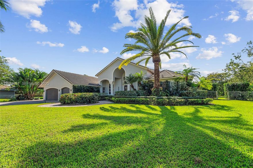 Set within the gated enclave of Emerald Springs Estates, this modern elegance is on the community’s largest lot with 1.5 acres of beautifully designed grounds, complete with a private sports court and resort-style outdoor living. Fully remodeled in 2021, the home offers 4 bedrooms and 4 bathrooms, each updated with new showers, designer fixtures, custom closets, and sleek white porcelain flooring that carries throughout the residence. The primary suite is a true retreat, with an oversized room highlighted by a Chanel-influenced walk-in closet with luxury designer flooring. The kitchen is equally impressive, reimagined with top-tier finishes and a complete collection of Fulgor Milano Italian appliances, including two refrigerators, a wine fridge, double oven, drawer microwave, built-in espresso machine, and an island beverage fridge. Bosch dishwasher, and new washer and dryer further enhance convenience. Three A/C units, a new water heater, and accordion shutters offer comfort and peace of mind. The pool and spa were fully renovated in 2021. Expansive outdoor space and room to personalize with an outdoor kitchen or additional amenities, this rare Davie estate blends luxury, privacy, and scale in a way few homes can match.