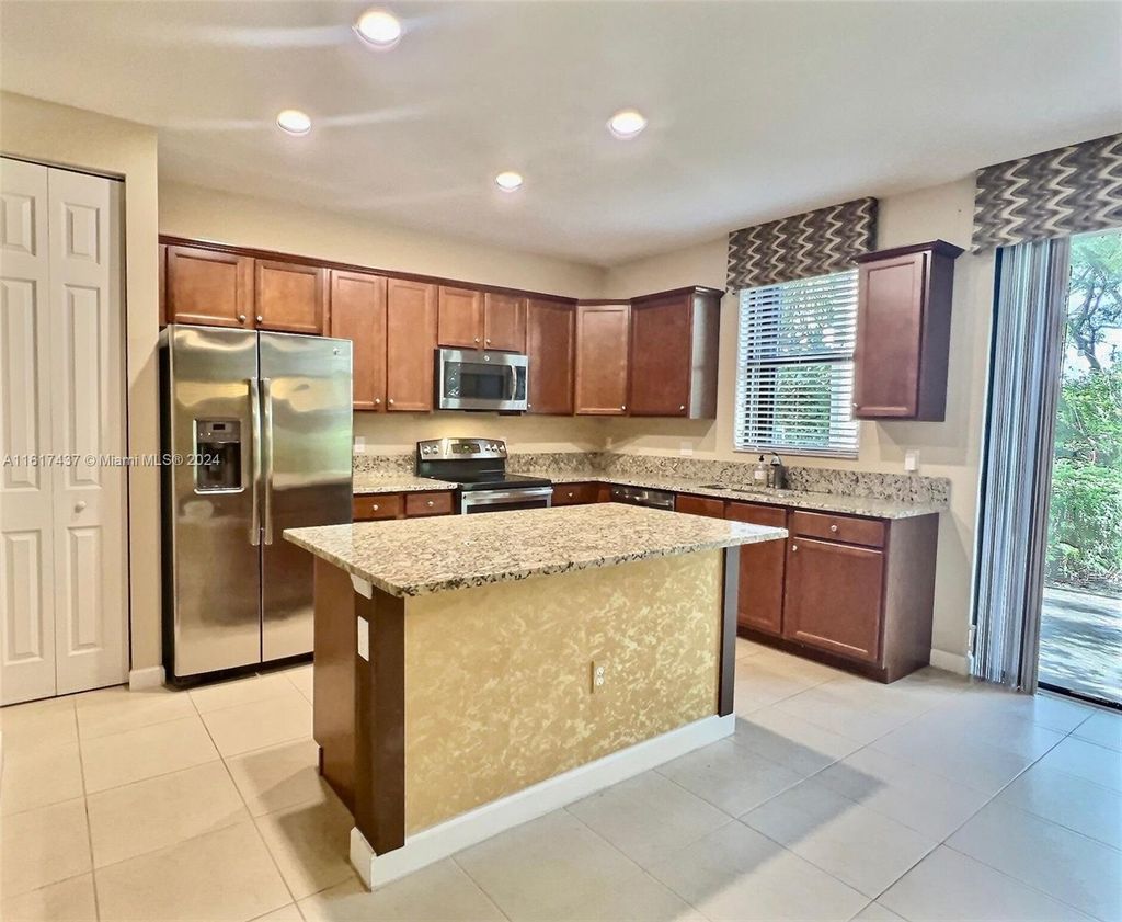 Photo of 3995 Allerdale Pl, Coconut Creek, FL 33073 (MLS # A11617437)