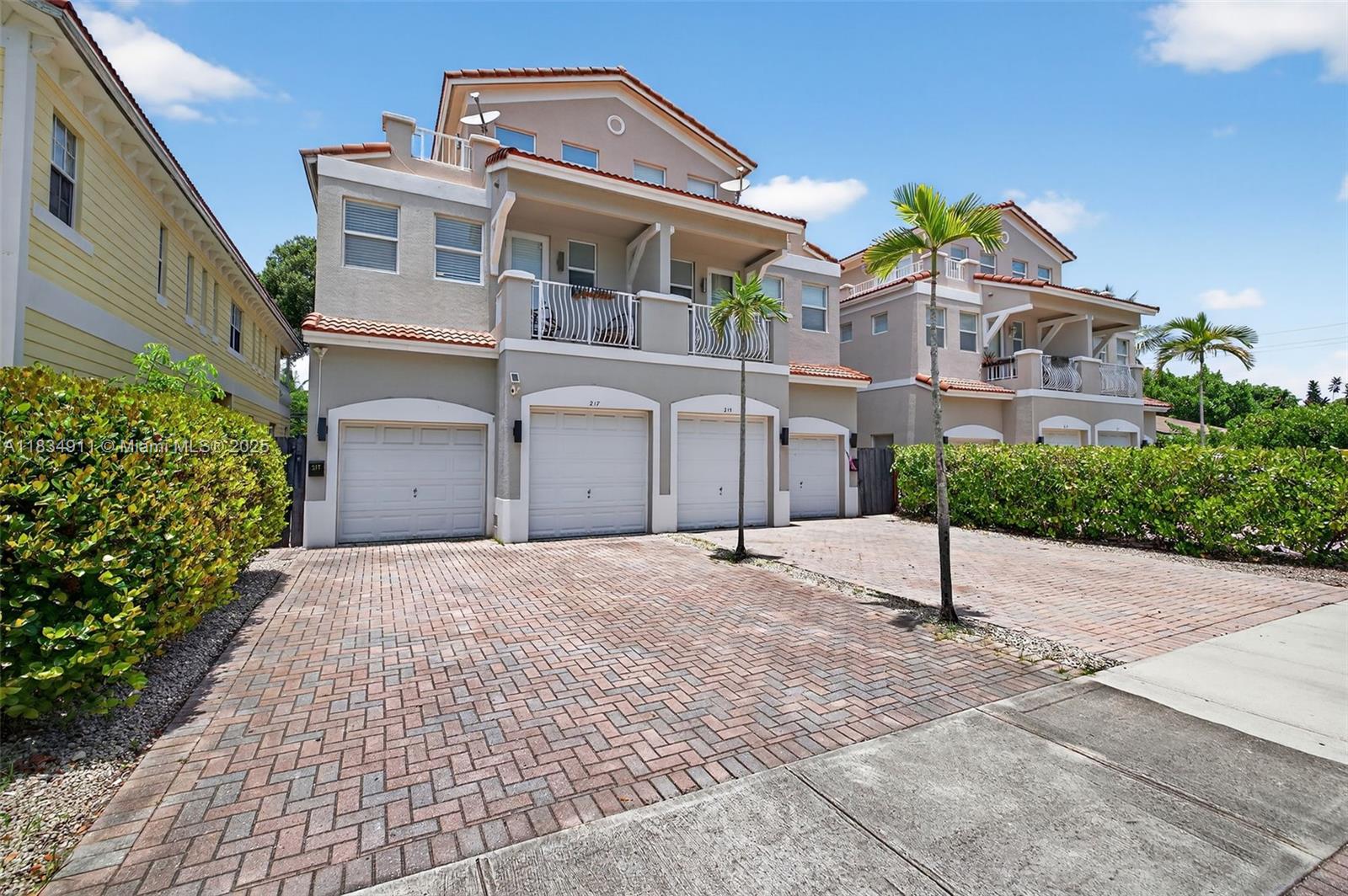 Truly one-of-a-kind, the largest townhome in desirable Tarpon River over 3,400 sq ft of curated design over 3 spacious levels with 6 beds & 5 baths. Two expansive living rooms and a sleek third-floor bar make it an entertainer’s dream. Modern upgrades throughout include new appliances, vanities, lighting, plumbing fixtures, artificial turf, and a refinished rooftop terrace downtown Fort Lauderdale views. Freshly painted with stylish window treatments and a flexible layout that works perfectly as an Airbnb, long-term rental, or private residence. Located minutes to Las Olas, Brightline, FLL Airport, Whole Foods, and more. Turnkey urban retreat blends upscale living with income potential in one of FT Lauderdale’s fastest-growing neighborhoods. A rare gem stands out in both size and style.