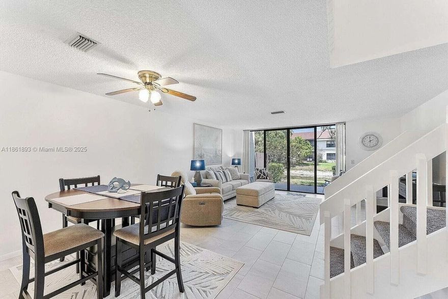 Discover this charming townhome with 1244 sq ft SUPER CLEAN renovated home nestled in the heart of Coconut Creek known as The Township. This home features an open floor plan with abundant natural light, porcelain floors throughout, modern finishes, and a spacious living area. The kitchen is well equipped to cook the meals you love. Enjoy peaceful views from the private waterfront patio or drink coffee right outside your kitchen in your private enclave. The community offers amenities such as a pool, fitness center, and clubhouse. Conveniently located near shopping, dining, and entertainment options. This home will sell fast as it comes completely furnished. HOA fee cover just about everything. Cable, water trash insurance pools tennis pickleball. The Beach is 15 min away.