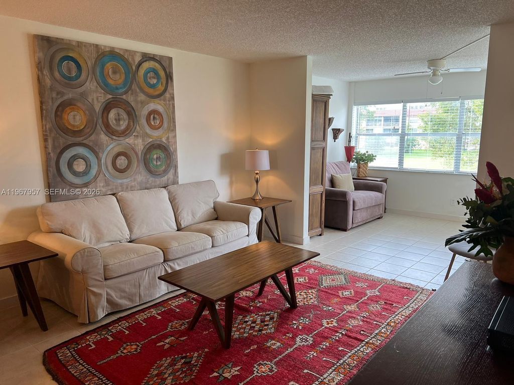 Photo of 9581 Sunrise Lakes Blvd #208, Sunrise, FL 33322 (MLS # A11967957)