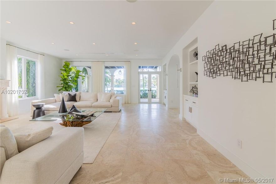 Western Wide Bay & Sunset views from this prime waterfront on the Venetian Islands. After a complete designer renovation, this home offers a grand living area, 5 spacious bedrooms, maid's room, media room & high ceilings throughout. Modern kitchen & custom bathrooms are stunning! The landscaped grounds offer a 2-car garage, oversized pool, several terraces, & endless water views.  Private & located several homes in from the causeway. Truly a special home in short distance to Lincoln Rd & Sunset Harbour.