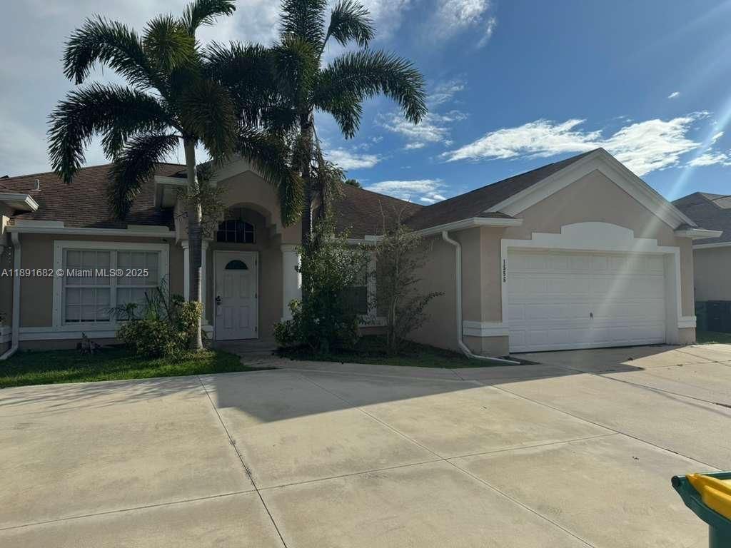 Photo of 1556 SW Jacqueline Ave, Port St Lucie, FL 34953 (MLS # A11891682)