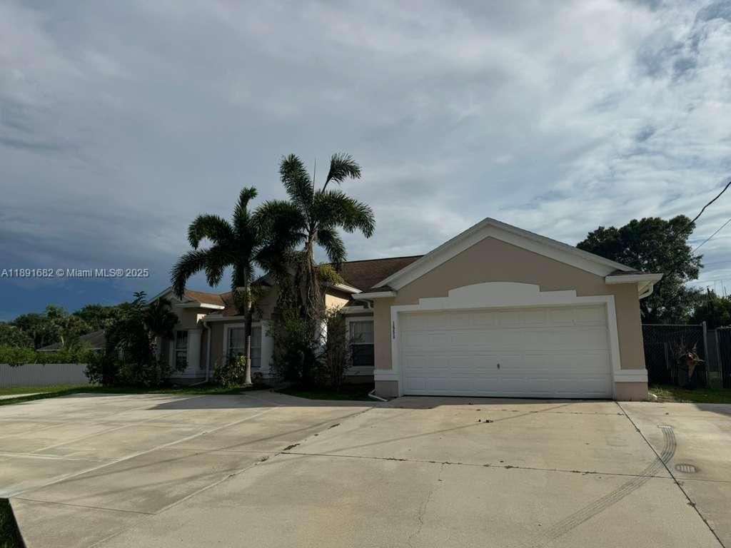 Photo of 1556 SW Jacqueline Ave, Port St Lucie, FL 34953 (MLS # A11891682)