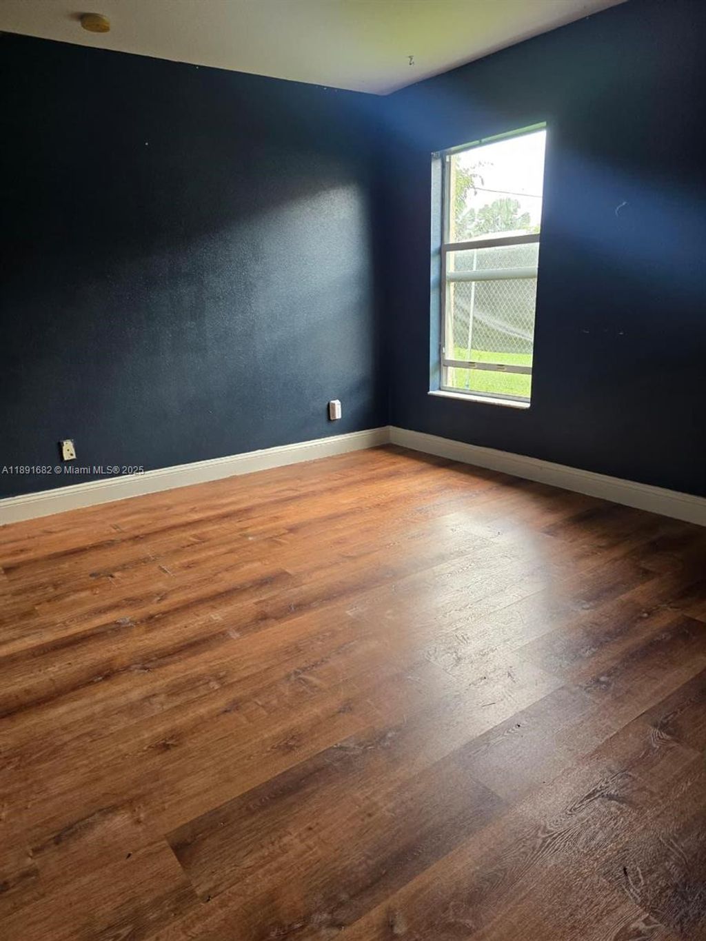 Photo of 1556 SW Jacqueline Ave, Port St Lucie, FL 34953 (MLS # A11891682)