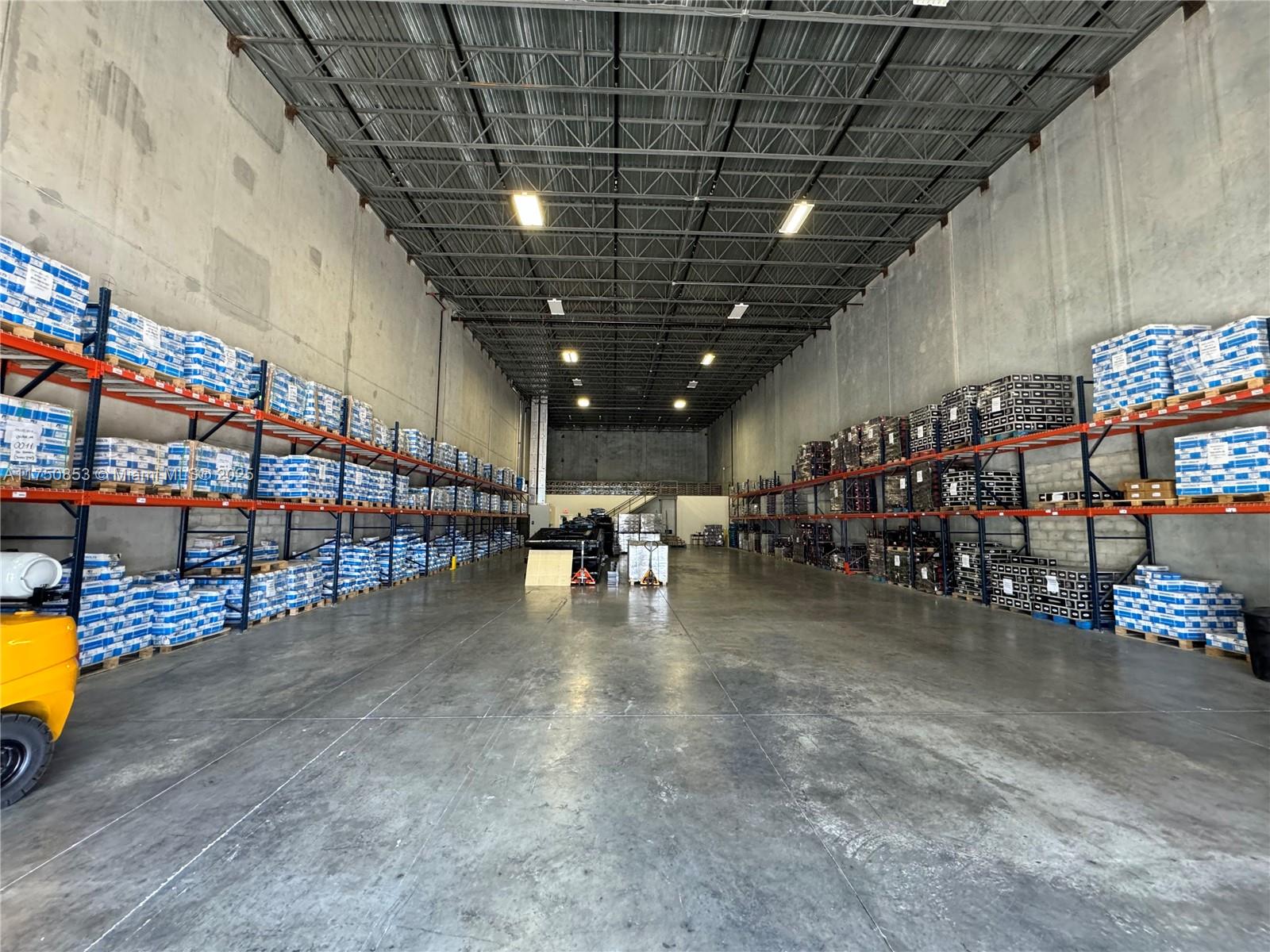 Opportunity for an investor looking to acquire a warehouse with a great tenant - leased until 05/31/27. Built in 2022, this unit has 11,007 SF Total Area, made up of: 7,047 SF of Warehouse Area + 1,980 SF of Office Area + 1,980 SF of Mezzanine. 30' ceiling height offers additional storage space. ESFR fire sprinkler system, concrete tilt wall panels, & steel joist roof system. Three (3) 9'x10' overhead doors-dock height. 12 assigned parking spaces. 277/480 Volt & 120/208 Volt. Excellent location on the industrial developing triangle of FL Turnpike, US 27-Okeechobee Rd, & I-75 to 826-Palmetto Expy, with immediate access to all these expressways. See attachments for additional info.
