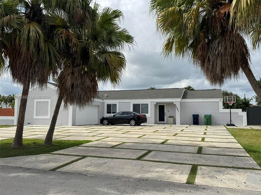 This beautiful home sits on an oversized 13K sq. ft. corner lot with a large, screened terrace, pool, privacy wood fence and tiki hut, excellent for entertaining with huge driveway for family and guests. Park an RV or boats along the side of this house and save on storage with plenty of space for all your toys plus a 2-car garage. Impact windows & doors, impact rated/insulated garage door, extra-large driveway, zebra shades, and ceramic floors. Quiet neighborhood with great neighbors. Grocery store + shops blocks away. Plenty of yard space for family and pets. Exterior freshly painted & pool replastered, new roof in 2017. 
Buyer’s agents are welcome, by appointment only.
