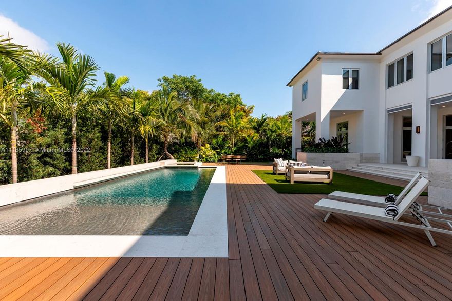 Find the apex of Coral Gables contemporary luxury inside this spacious, 8 bed and 7.5 bath estate. It spans 7,183 sqft and is the perfect family-friendly home, located in the privately gated community of Cocoplum. Built in 2008 and completely updated in 2021. Residents will discover a smart home with features that include tech-enabled lights, shades, music, cameras, 10’ to 18’ high ceilings, and European white oak floors. A highlight of the home is the chef’s gourmet kitchen featuring luxury appliances and detailed with a large quartzite waterfall island. Other beautifully appointed spaces include an entertainment bar room and a tropical backyard with a heated pool and jacuzzi. Extra features: 3 car garage, Cocoplum gated community living amenities.