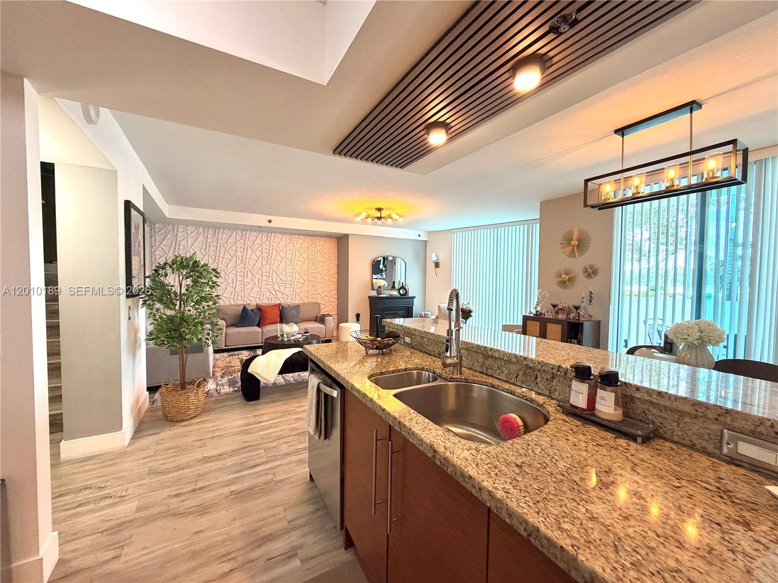 TAO SAWGRASS CONDOMINIUM - Residential