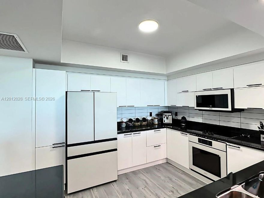 Spacious renovated 2BD/2.5BA residence at One Fifty One Biscayne featuring 1,758 SF, updated finishes, floor-to-ceiling windows, open living areas, and 2 assigned parking spaces. High-floor unit with great natural light and an excellent split layout. Convenient North Miami location near Aventura, beaches, major highways, Costco, Target, and dining.
