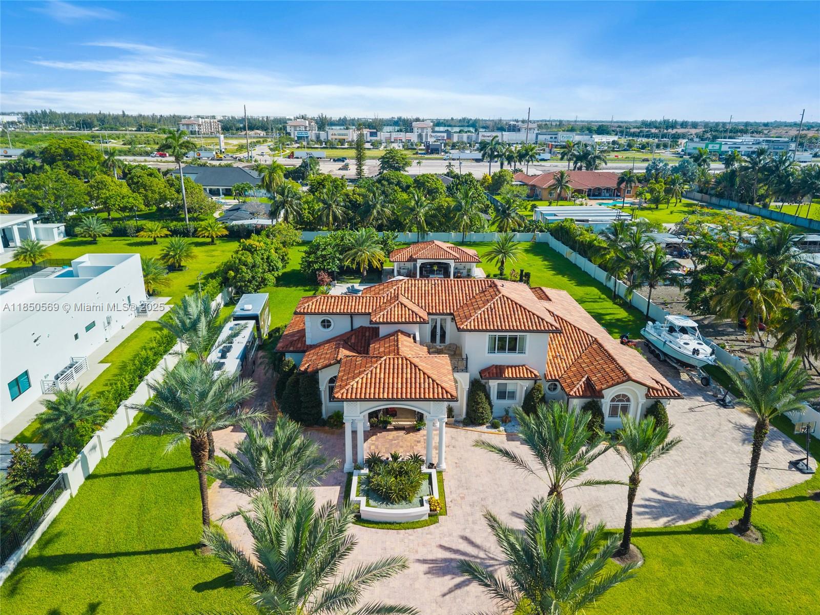 Welcome to this contemporary architectural jewel located in one of the most exclusive areas of Hialeah Gardens. This impeccable design residence offer 5 bedrooms, 4 bathrooms, high ceilings and open layout that maximizes natural light and panoramic views. Gourmet Kitchen with state of the art appliances with summer kitchen in the backyard and beautiful pool. Built with the highest quality standards and luxury finishes, this property combines modern elegance with functionality. Enjoy absolute privacy of a dead-end street with no neighbors on one side. A unique property for those looking for the best lifestyle and comfort.