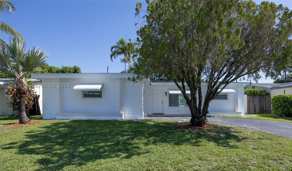 Photo of 8571 NW 27th Pl, Sunrise, FL 33322 (MLS # A12043663)