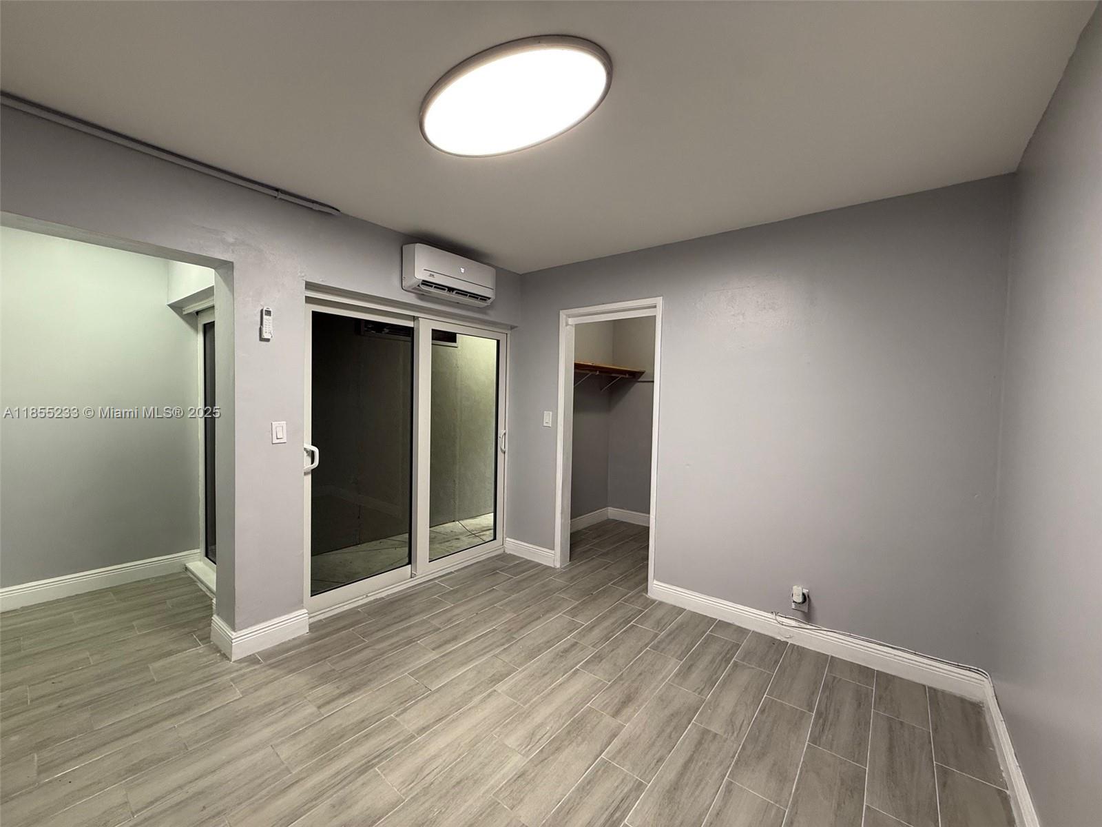 THIS ONE BEDROOM, 1 BATHROOM WITH PRIVATE ENTRANCE, 1 ASSIGNED PARKING SPACE EFFICIENCY IS MOVE IN READY. UNIT HAS FRESH PAINT, NEW FLOOR, NEW IMPACT SLIDING DOORS, NEW BATHROOM, NEW AC, NEW REFRIGERATOR, NEW MICROWAVE, WALK-IN CLOSET & BIG BACKYARD. IT'S A MUST SEE!. RENT INCLUDES POWER, WATER, SEWER & LAWN CARE. SUPER FAST APPROVAL.