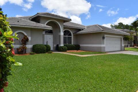 Photo of 10205 SW 12th St, Pembroke Pines, FL 33025 (MLS # A12023054)