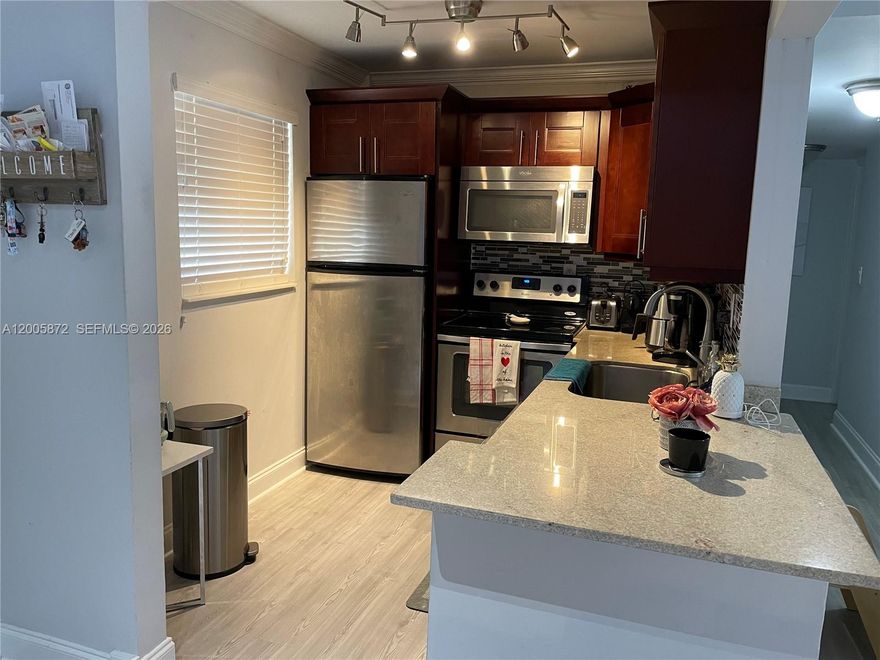 Beautifully upgraded unit in Courtyards at Kendall offering modern finishes and exceptional natural light throughout. This residence features stylish vinyl plank flooring, sleek Whirlpool appliances, and spacious walk-in closets with custom built-in organizers. Enjoy an open, airy feel with three sliding glass doors in each room, filling the home with natural light and creating a seamless indoor-outdoor flow to your private balcony—perfect for relaxing or entertaining.
Ideally located in the heart of Kendall, just minutes from top shopping, dining, and major roadways, this home combines comfort, convenience, and lifestyle. The community laundry room is conveniently located just steps from the unit for added ease. A perfect opportunity for homeowners or investors alike.