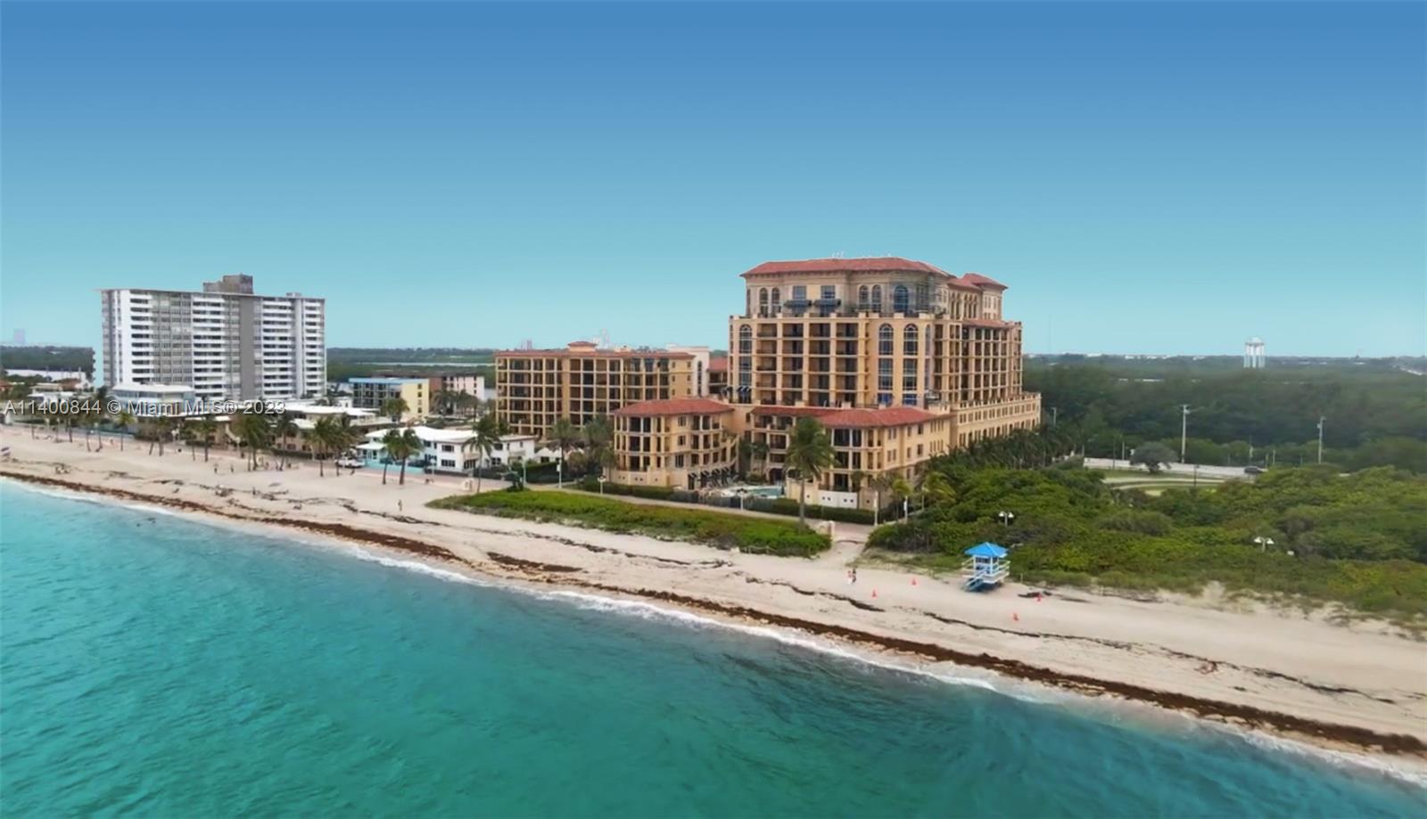 Experience an enviable lifestyle in Positano, Hollywood, Florida's unique oceanfront condominium, steps from the famous Broadwalk! Enjoy a panoramic view of the Ocean, Intracostal, and North Beach Park. Relax with family and friends on the expansive terrace that flows out of the oversized great room. The 2,935 square foot condo features a private elevator foyer, gourmet kitchen, separate laundry room, oversized primary suite featuring floor-to-ceiling windows and his & hers bathrooms, guest bedrooms with sliding glass door to the terrace and en suite bathroom, den usable as an office, media room or 3rd bedroom. 2 garage parking spaces and a storage unit. Amenities include valet, security, pool, hot-tub, fitness center, and more.