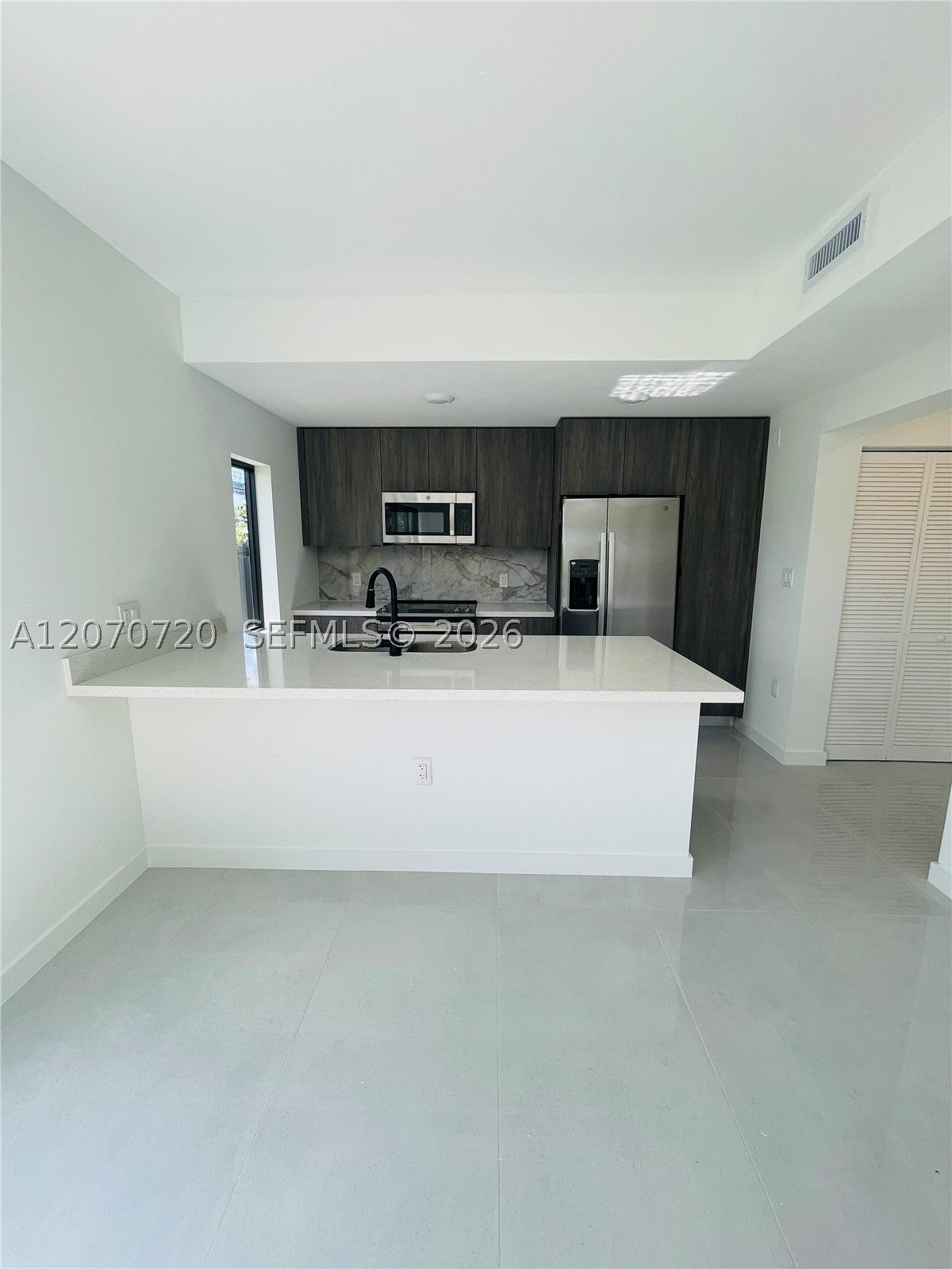 209 NW 13th Pl