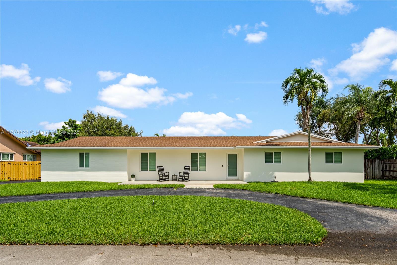 Impeccable 4-bedroom, 2-bath home in highly desirable Palmetto Bay, set on an expansive 15,120 SF lot on a quiet dead-end street within an A+ school district. A foyer welcomes you into the formal living room with abundant natural light, a formal dining room for family gatherings, and a spacious family room. The kitchen has cabinets, stainless steel appliances, and a breakfast area overlooking the backyard. Outdoors, enjoy a fenced vast patio with a pool, covered terrace, kids’ playground, and side driveway perfect for an RV or boat—ideal for family adventures. Plenty of parking, two-car garage and wide driveway. Fully hurricane-protected with impact-resistant doors and windows throughout. With its excellent layout, prime location, and family-friendly neighborhood, this home is a must-see.