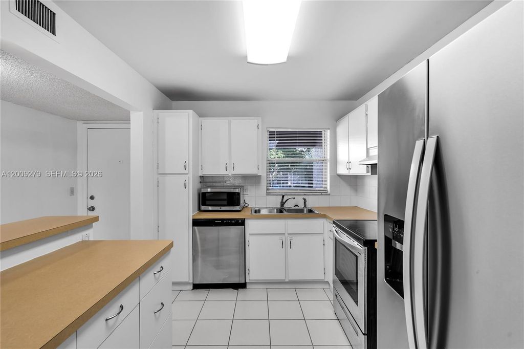 Photo of 8513 Old Country Mnr #415, Davie, FL 33328 (MLS # A12009279)