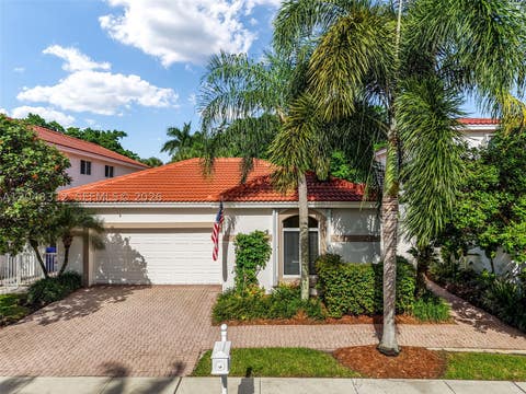 Photo of 1221 E Bel Aire Dr E, Pembroke Pines, FL 33027 (MLS # A12048332)
