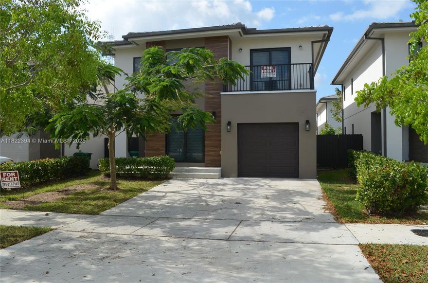 Single family home in new community  100% concrete construction. The property has 5 bedrooms and 4.5 bathrooms (2 masters upstairs), garage, patio and driveway. Finishes include impact windows and doors, high ceilings, porcelain floors on both levels, open kitchen with quartz countertops, stainless steel appliances, washer and dryer. Porcelain tiled bathrooms, master bedroom offers large bathroom and large walk-in closet. This property have a guest suite with a separate entrance, full bathroom .