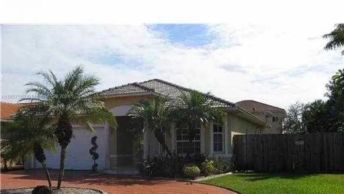 8856 Nw 140th Ln, Miami Lakes, Miami-Dade County, Florida - 4 Bedrooms  
2 Bathrooms - 