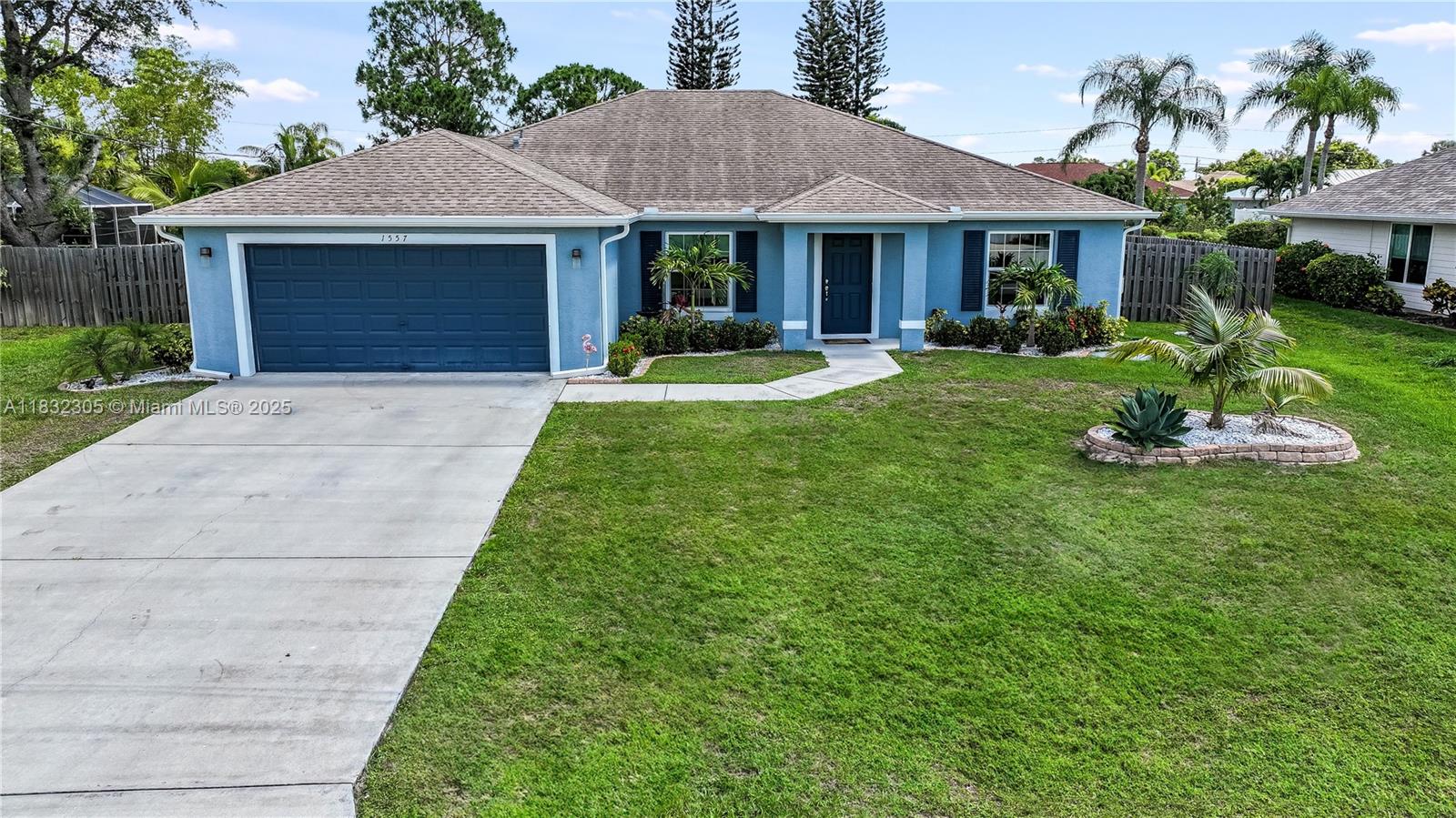 Welcome to your dream home in the heart of Port St. Lucie! This fully renovated, spacious single-family house is filled with natural light and thoughtfully designed for both comfort and entertainment. Step out back into your private oasis: a massive yard featuring an oversized saltwater pool with a new pump, an outdoor bar with poly coating, built-in garbage, and beverage fridge, plus a cozy fire pit, pergola, and charming string lights to set the mood. The oversized, fully fenced yard also includes a shed, offering plenty of space for gatherings with family and friends. Modern kitchen with granite countertops, soft-close cabinetry, stainless steel appliances, and recessed lighting. Situated in an unbeatable location, this home is ready for you to enjoy both luxury and relaxation!