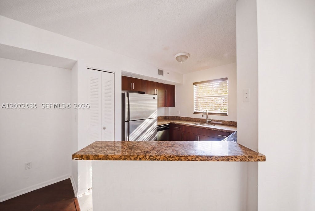 771 N Pine Island Rd 205